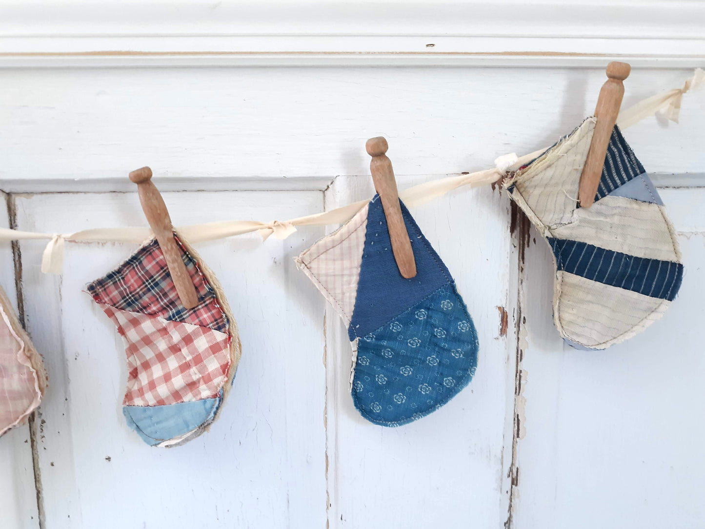 Antique Quilt Stocking Ornaments, Wooden Clothes Pegs, and Knotted Cloth Hanger