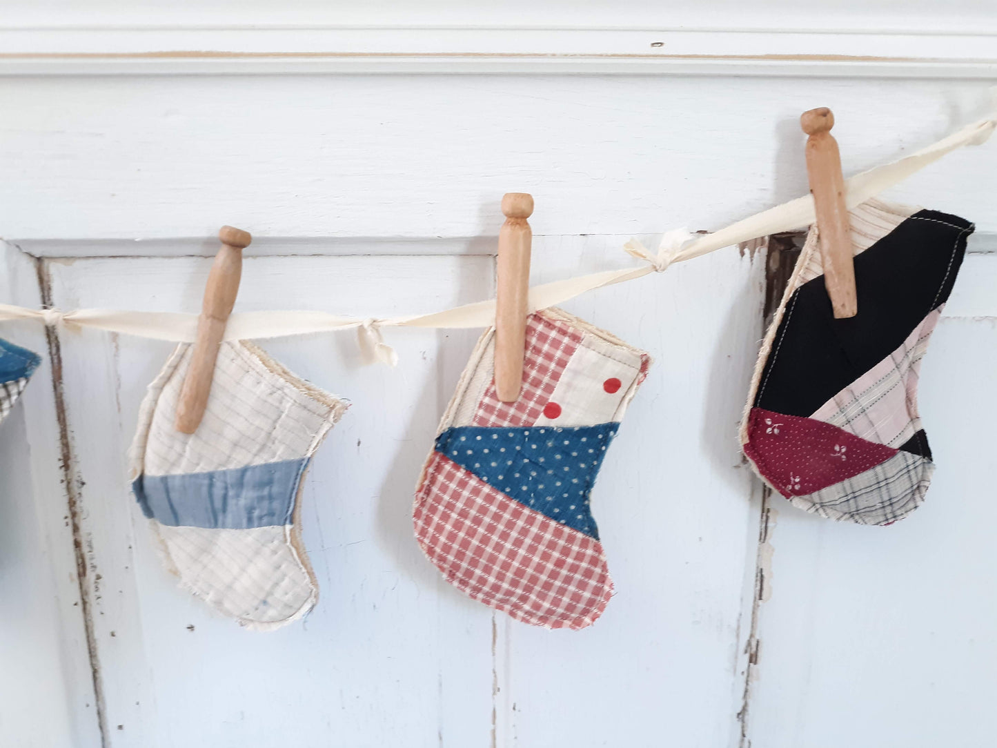 Antique Quilt Stocking Ornaments, Wooden Clothes Pegs, and Knotted Cloth Hanger