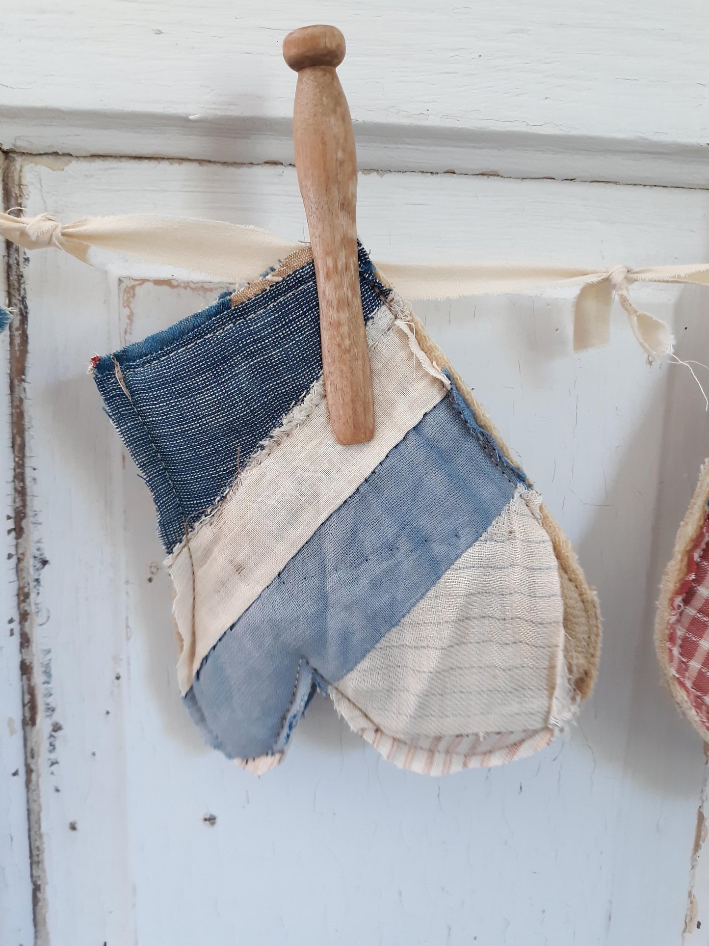 Antique Quilt Stocking Ornaments, Wooden Clothes Pegs, and Knotted Cloth Hanger