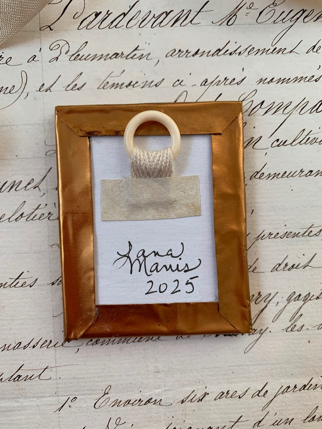 Pale Coral Heart in Hand in Embossed Copper Frame