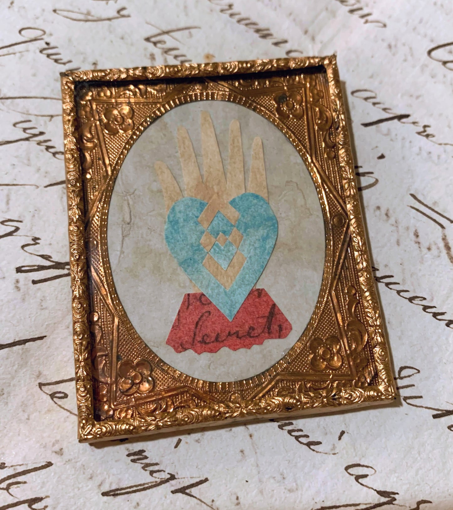 Aqua Heart in Hand in Embossed Copper Frame