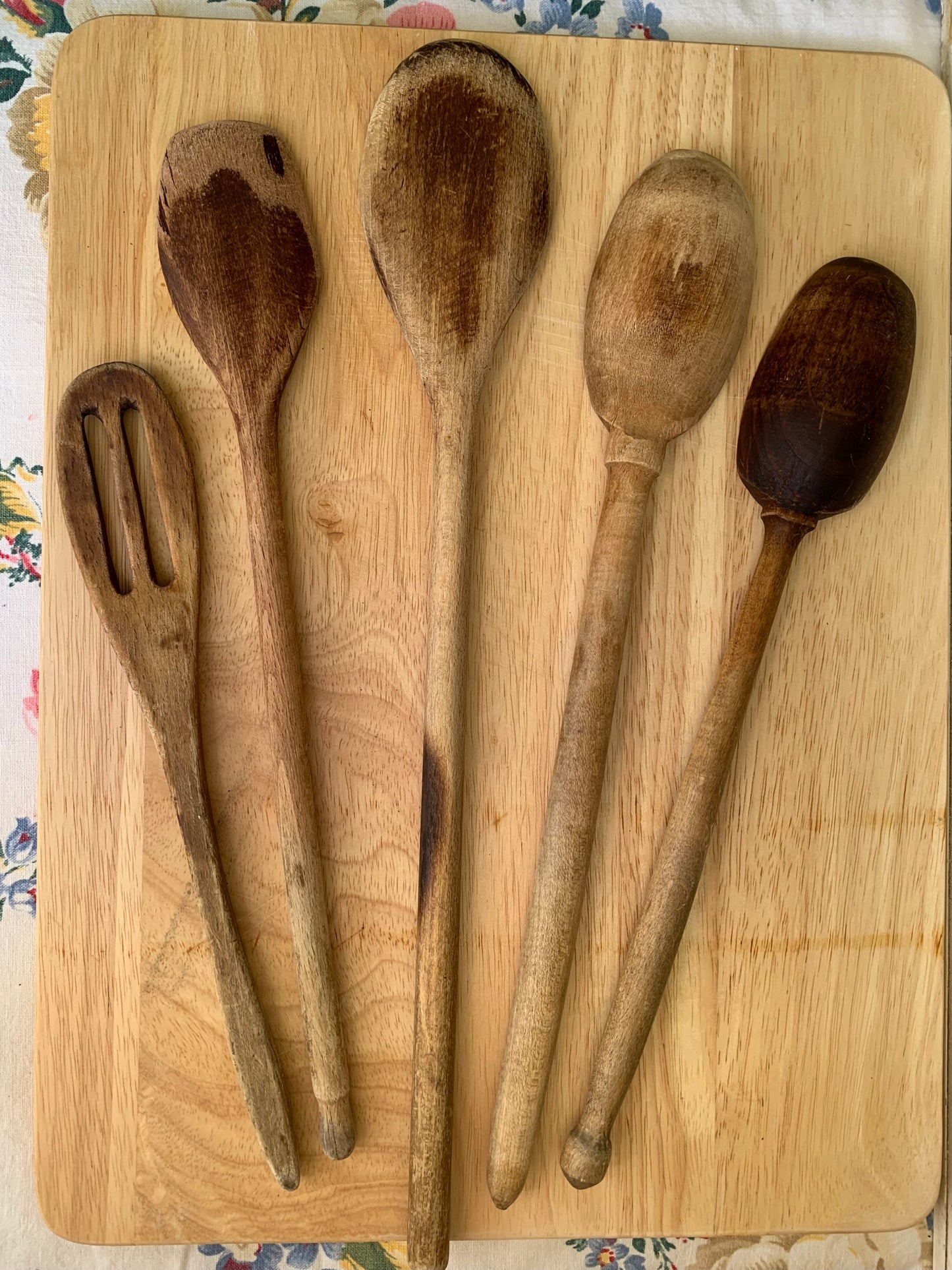 Rusty Pitcher with 5 Wooden Spoons