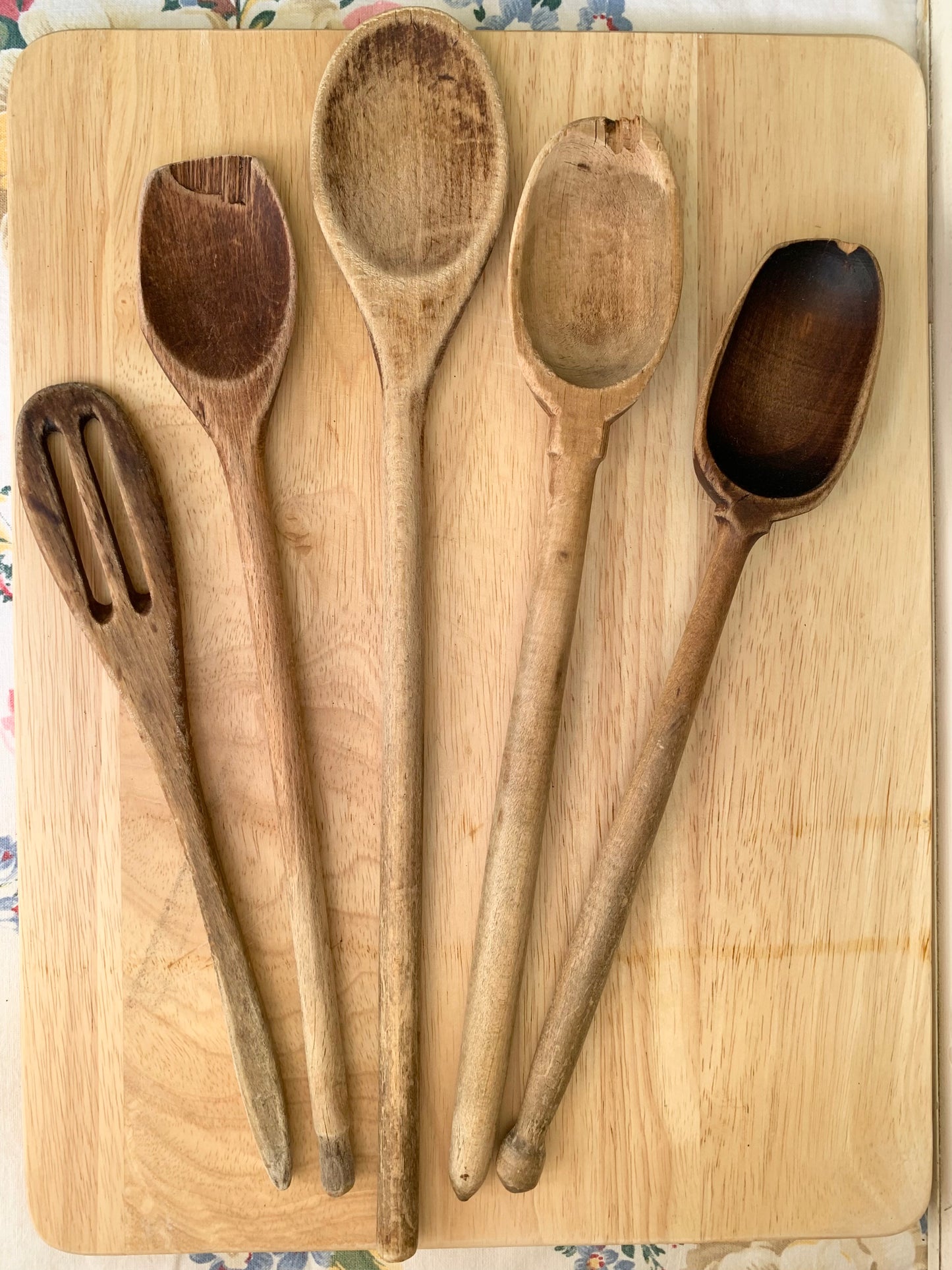 Rusty Pitcher with 5 Wooden Spoons