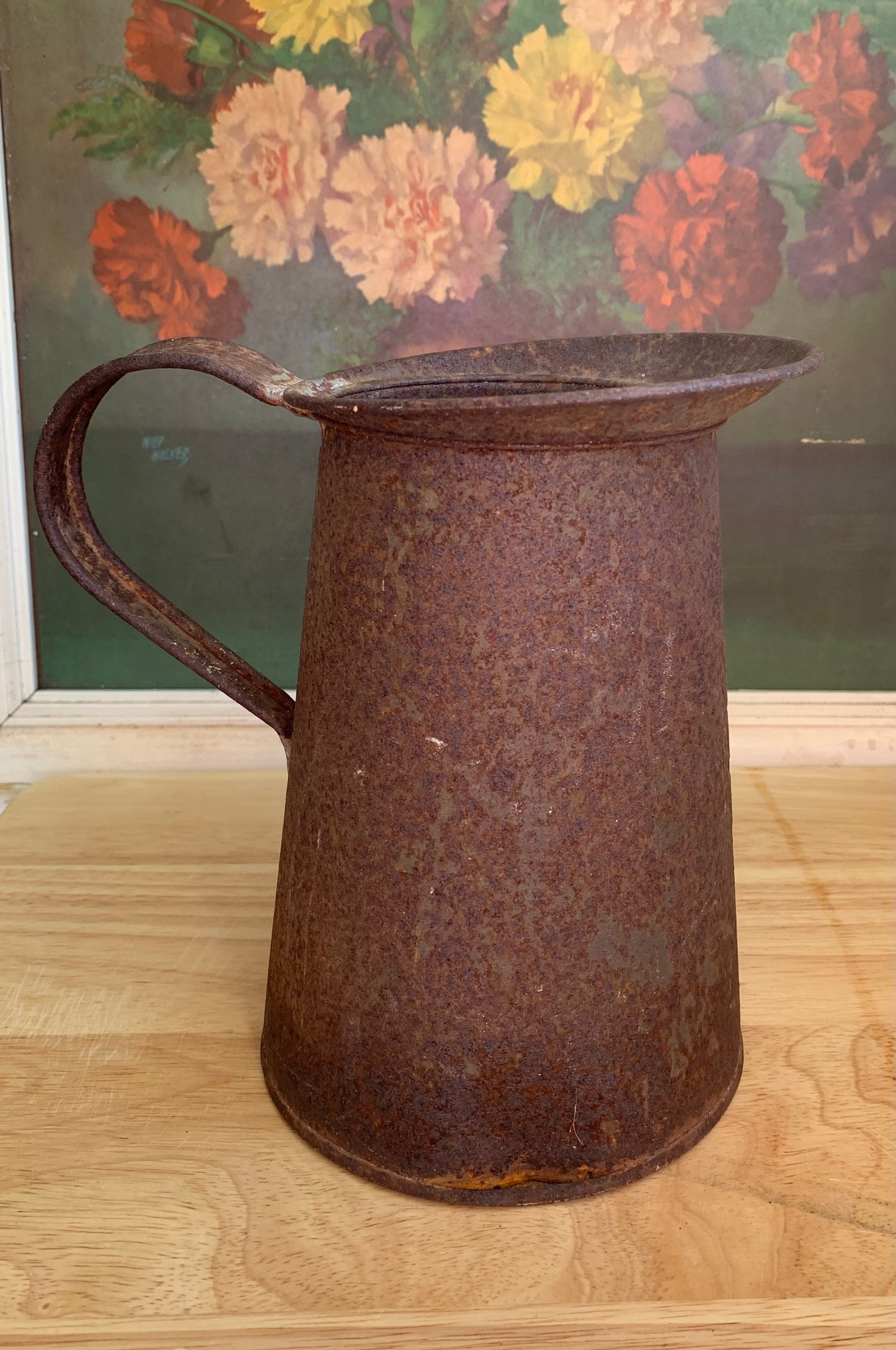 Rusty Pitcher with 5 Wooden Spoons